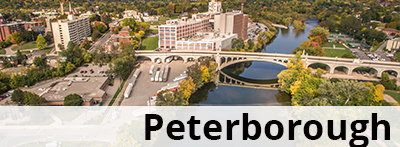 Bird's eye-view of the City of Peterborough with text Peterborough.